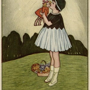 Little girl on a hillside with her doll