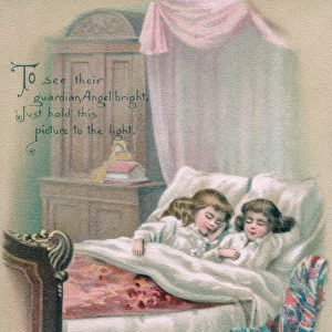 Two little girls asleep on a Christmas card