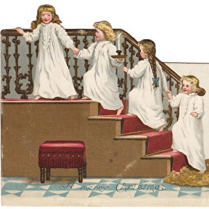 Four little girls in nightdresses on a Christmas card