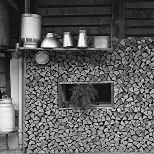 Logs stored under a chalet in Switzerland