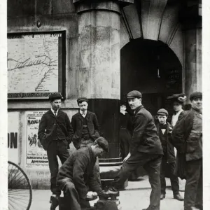 London Life - A Shoeblack works outside a Station Entrance on The City and South London Railway (C&SLR), the tunnels and lines of which now form the Bank Branch of the Northern line, Date: circa 1910s London Life - A Shoeblack works outside a Station Entrance on The City and South London Railway (C&SLR), the tunnels and lines of which now form the Bank Branch of the Northern line, Date: circa 1910s