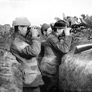 Looking for the daring German sniper: British soldiers engaged in locating one of the enemys sharpshooters