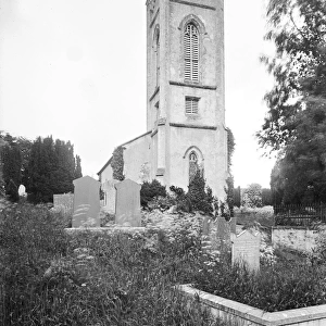 A low view of a Church from the graveyard