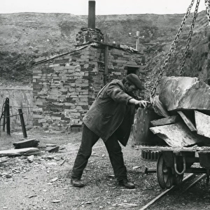 Lowering a tram, Penyrorsedd Slate Quarry, North Wales