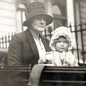 Her Majesty Queen Elizabeth II as baby in pram with nanny