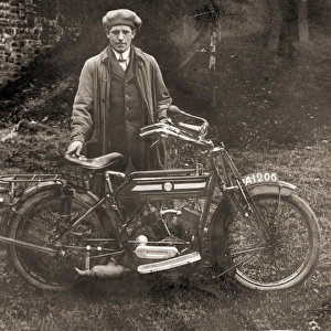 Man with 1910 Rex motorcycle