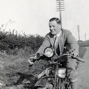 Man on 1926 Triumph motorcycle