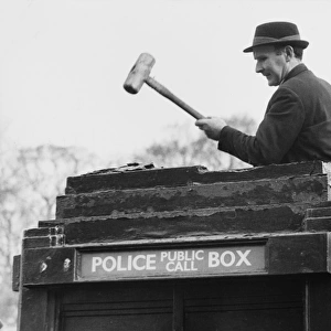 Man demolishing top of police public call box