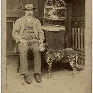 Man with dog and parrot