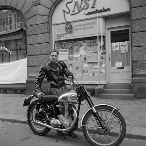 Man with motorbike