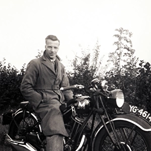 Man sitting on his 1934 Matchless motorcycle