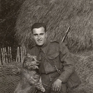 Man in uniform with a terrier dog at a farm