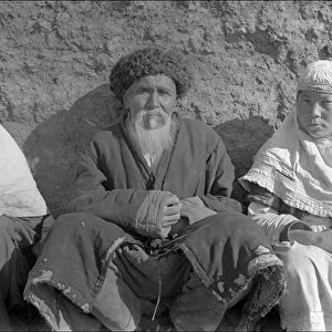Man and two women in Kashgar or Kyrgyzstan