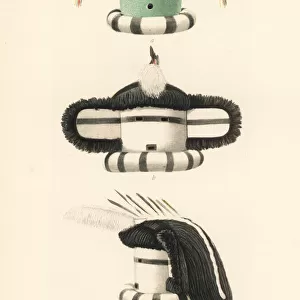 Masks of Ya mukakto (a) and Hu tutu (b, c), Zuni Nation