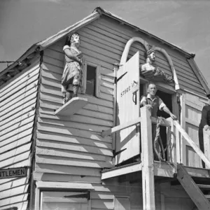 Men at coastal storage hut