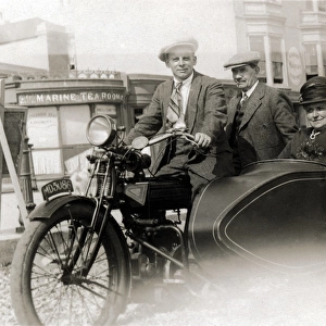 Men and lady on a 1914 / 15 Enfield motorcyle & sidecar