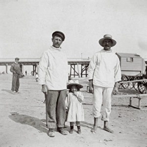 Two men and a little girl, Southwold, Suffolk