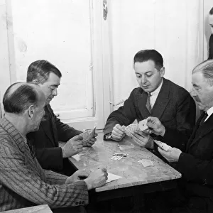 MEN PLAY CARDS 1930S