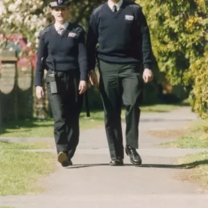 Met Police PC and WPC, suburban scene