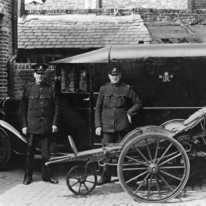 Metropolitan Police officers with hand ambulance