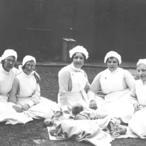 Midwives and babies, outdoors Midwives and babies, outdoors