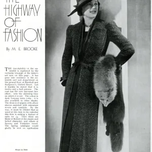 Model wearing a full length coat 1937