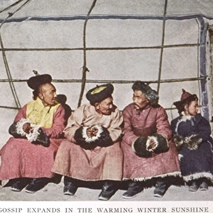 Mongolia - Men chatting outside a yurt