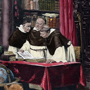 Monks reading a copy of the Gutenberg Bible