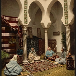 Moorish women making Arab carpets, Algiers, Algeria