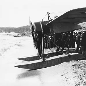 Morane-Soulnier Seaplane Monoplane Parked on a Beach wit?