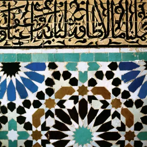 Mosaic with arab and kufic caligraphy (top) on a wall of the