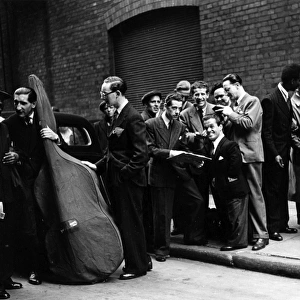 Musicians in a London street, 1940s
