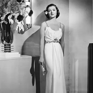 Myrna Loy in a Dolly Tree gown from Too Hot to Handle