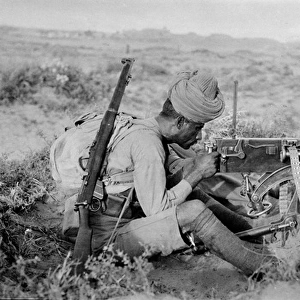 Naik Shahamad Khan, manning a Vickers-Maxim gun