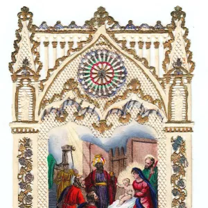 Nativity scene on a paper lace Christmas card