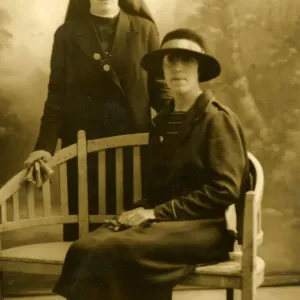 Nurse in veil and coat, possible nurse in felt hat and coat Nurse in veil and coat, possible nurse in felt hat and coat