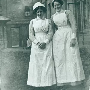 Two nurses outside institution