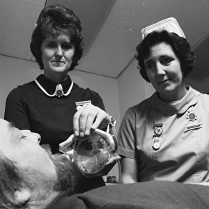 Nurses and patient at the Medical Centre, Hendon