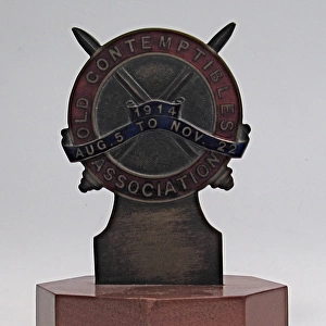 Old Contemptibles car badge on wooden base, WW1