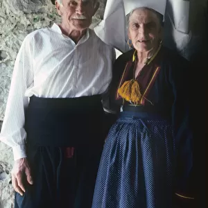 Old couple dressed in traditional costume near Dubrovnik