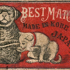 Old Japanese Matchbox label with a cat and a dog in a hat