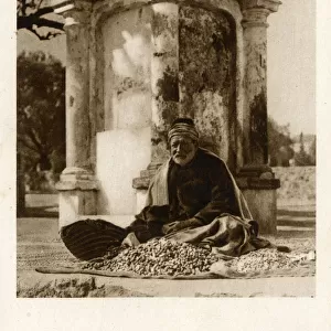 Old muslim seller of seeds - Rhodes, Greece