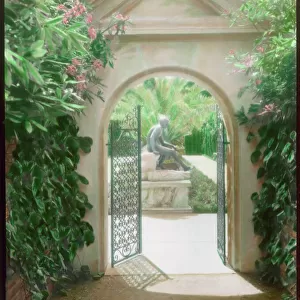 Open gateway into an Italian garden