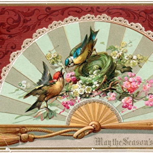 Ornate fan with birds and flowers on a Christmas card