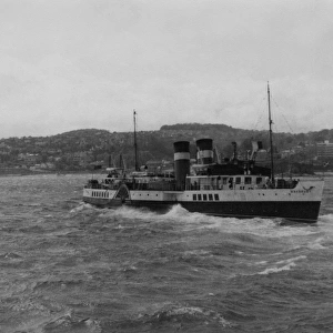Paddle steamer off Torquay Harbour in a storm