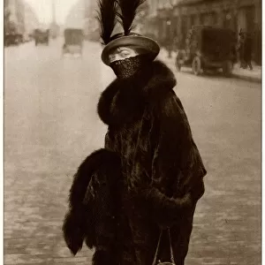 Parisian woman wearing toque hat with feathers 1914