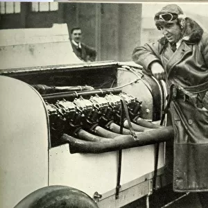 Parry Thomas, racing driver, inspecting 400 hp engine