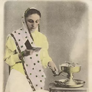 A Parsi woman at a fire altar