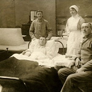 Three Patients (one in bed) with nurses