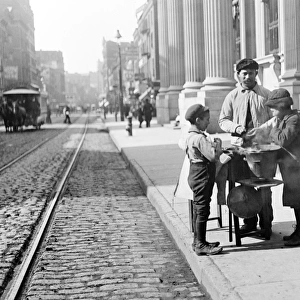 Peanut vendor selling nuts on 42nd Street in New York, USA